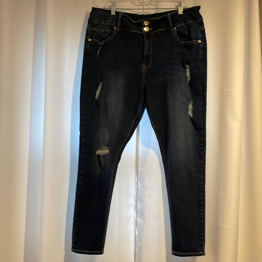 Dark wash ripped skinny jeans